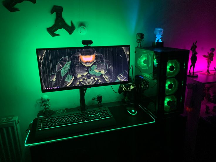 Professional gaming review station with multiple monitors and testing hardware